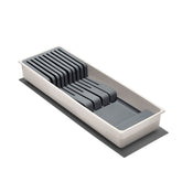 OXO Good Grips Compacto, vista superior del organizador para cajón, ahorro de espacio y acceso seguro.