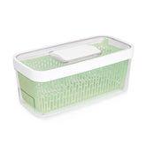 OXO GreenSaver grande y blanco: conserva frescura de verduras por más tiempo.