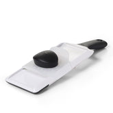 Mandolina OXO Good Grips con 1 mm para cortes precisos.