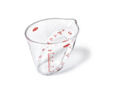 Jarra medidora angular de OXO de 60 ml, lectura desde arriba para precisión.