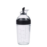 OXO Good Grips Mini agitador para aderezos, vista general, práctico para mezclar.