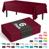 Mantel plástico burdeos Party Solids de 54x108, ideal para cubrir mesas grandes.