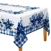 Mantel Peryiter azul y blanco con poinsettia, ideal para cenas navideñas.