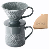 Polydremio colador V60 con filtros, facilita un café limpio y controlado.