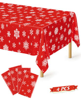 Mantel QZYL con copos de nieve rojos para decoración navideña elegante.