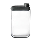Rabbit Frasco, perfil delgado negro, ideal para transporte discreto.