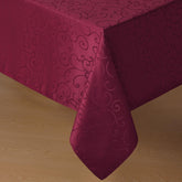 Mantel Romanstile jacquard navidad burdeos con damasco floral, ideal para cenas festivas.