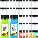 Roshtia botellas 2oz claras con tapa negra, ideales para jugos y batidos sin derrames.