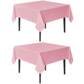 Mantel sancua rosa 54x54 en juego de dos para mesas cuadradas.