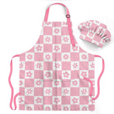 Delantal SANDJEST para niñas con diseño a cuadros, práctico y colorido.