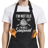 Delantal SANDJEST con bolsillos, ideal para barbacoa y utensilios al alcance.