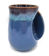 Taza Selamica de porcelana 18oz con mango derecho, ideal para café.