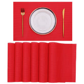 Manteles individuales SHACOS en rojo, ideal para decorar la mesa en Navidad.