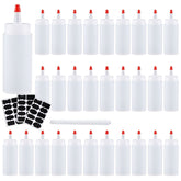 Botellas exprimidoras Shekure 4 oz en mesa, útiles para condimentos.