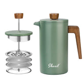 Prensa Shoxil con mango de madera verde, ideal para desayunos aromáticos en casa