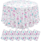 Mantel Sliner con copos de nieve rosa para una mesa protegida y festiva.
