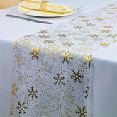 Snowkingdom: corredor de mesa con copos de nieve dorados para Navidad
