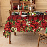 Mantel Softalker navidad rojo con cuadros y flores, ideal para cenas festivas.