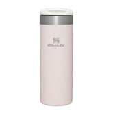 Stanley Aerolight Transit Mug crema metálica vista frontal para café caliente en la oficina.