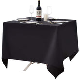 Mantel cuadrado negro Surmente de 52x52 para proteger la mesa en eventos.