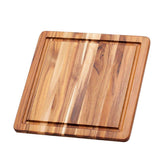 Teakhaus tabla con canal de jugo para recoger líquidos al cortar.