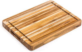 Teakhaus tabla de corte en superficie de teca, ideal para preparación diaria.