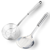 TENTA KITCHEN espumadera ranurada con mango ergonómico para seguridad al manipular líquidos.