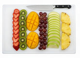 Tabla Thirteen Chefs con canal de jugo para evitar derrames al rebanar carnes.