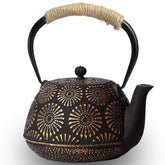 TiwisiTe Tetsubin, tetera japonesa negra con dorados, ideal para ceremonias de té elegantes.