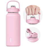 Botella TOURIT 32 oz rosa con aislamiento para bebidas frías o calientes.