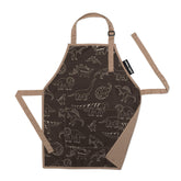 Delantal Urban Infant Pequeño Ayudante con dinosaurios, ideal para cocinar de forma limpia.