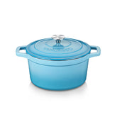 Olla vancasso de hierro esmaltado azul con tapa de acero inoxidable para sellar sabores.