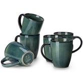 Taza vancasso Starry, vista frontal, acabado verde único y ideal para café diario.