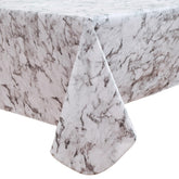 Mantel Walrus de vinilo durable con forro de felpa marble protege la mesa.
