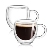 Tazas espresso Wells con doble pared y mango, mantienen la bebida caliente y la mano cómoda.