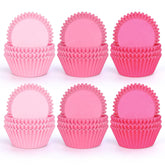 Whaline bases para cupcakes con gradiente rosa, ideales para decoración festiva.