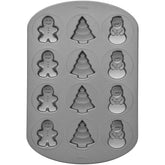 Molde Wilton árbol para hornear galletas navideñas, fácil de decorar.