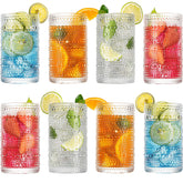 Vasos wookgreat con relieve grabado para agua y cócteles.