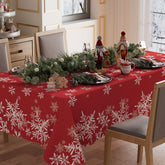 Mantel XCHI invierno rojo con copos de nieve, ideal para cenas festivas.