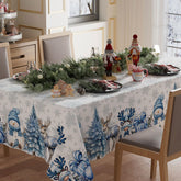 Mantel XCHI con muñeco de nieve y ciervo, ideal para cenas navideñas.