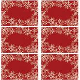 Mantel XCHI con copos rojos, ideal para crear ambiente festivo en cenas.