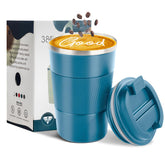Taza de viaje YINBAOGE azul frente interior visible, mantiene café caliente durante horas.