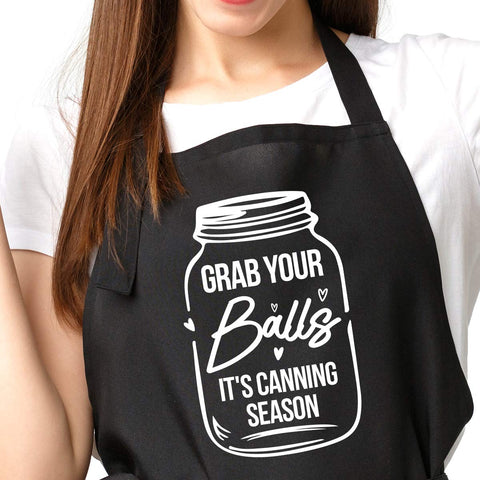 Delantal Aakihi divertido para mujer, negro con bolsillos, ideal para cocinar con estilo.