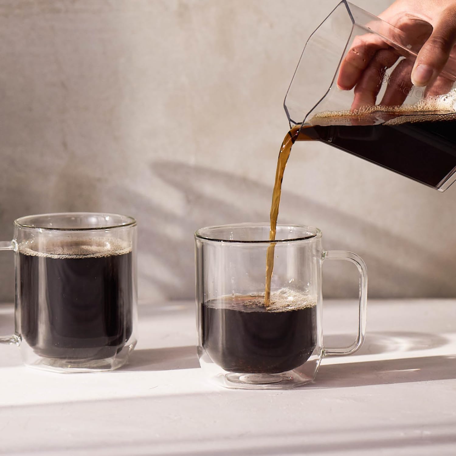 AeroPress Carafe de Tritan, resistente y ligera para transportar.