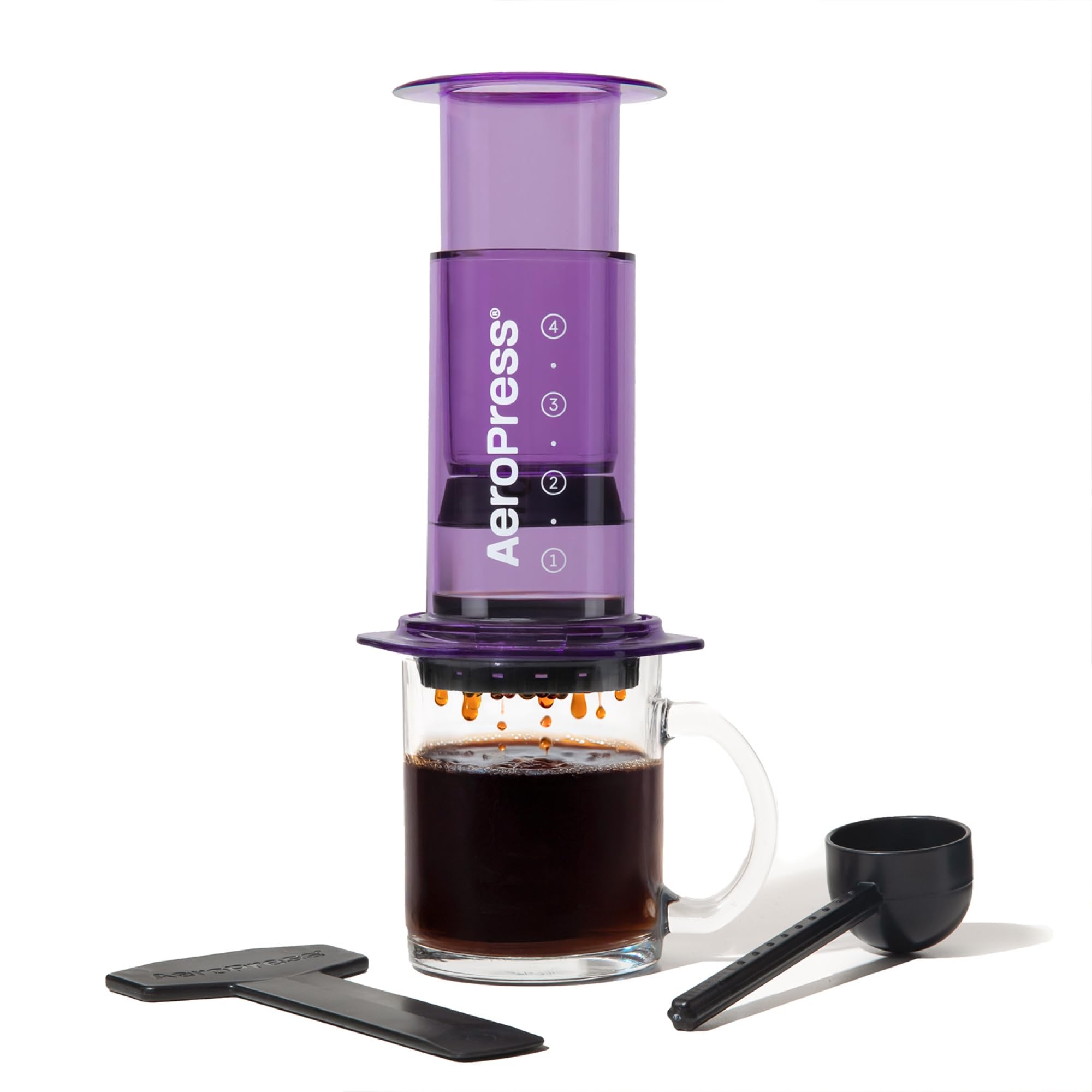 AeroPress morado claro: prensa en proceso y sabor suave.