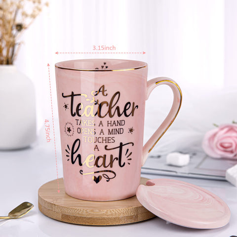ALBISS taza rosa marmolado, textura única y acabado dorado destacado.