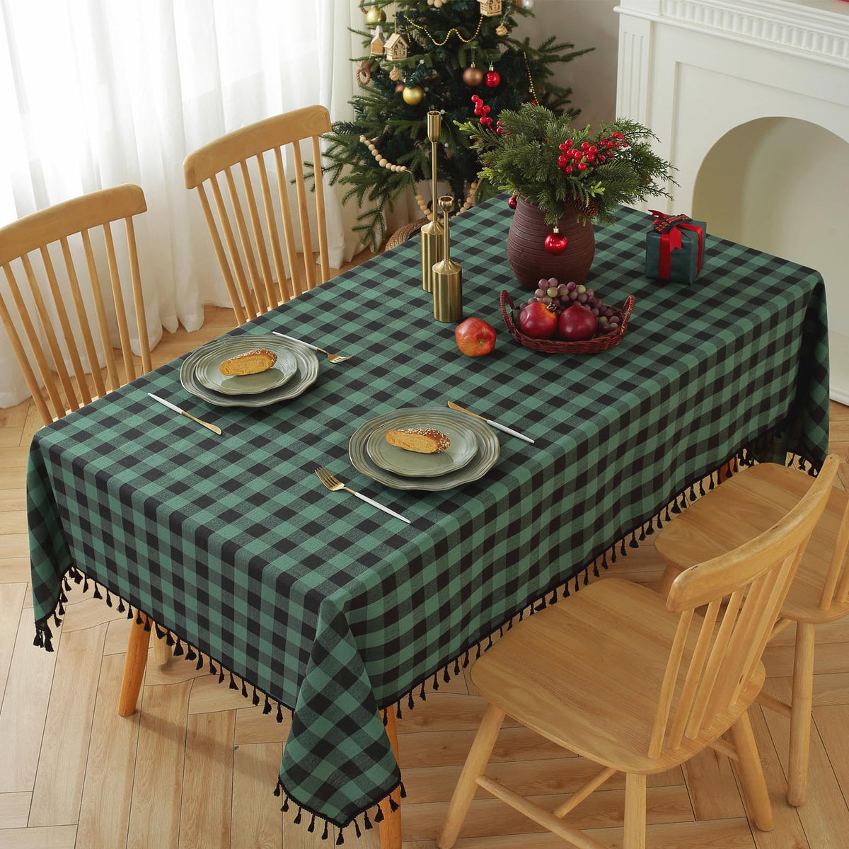 Mantel Alsoo con cuadros rectangulares de mezcla lino-algodón, protege la mesa con suavidad.
