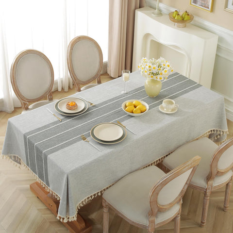 Mantel Alsoo rectangular impermeable con diseño rústico gris y líneas, protege la mesa.