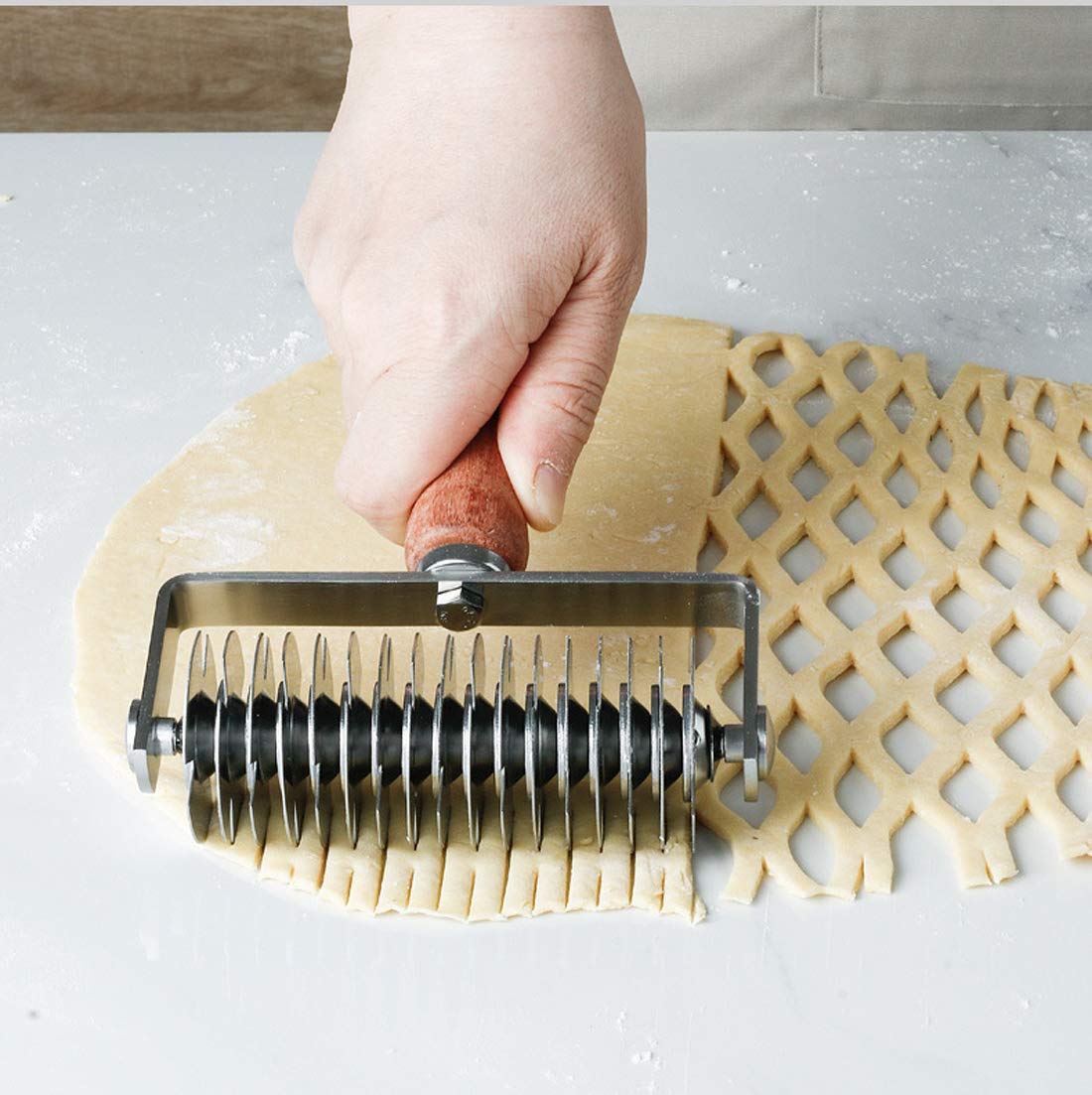 AMPSEVEN rodillo-rejilla-masa-pizza: genera rejilla crujiente para pizzas de aspecto profesional.