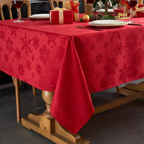 Mantel Anlass Navidad jacquard con copos de nieve visto frontal para mesa festiva, efecto elegante.